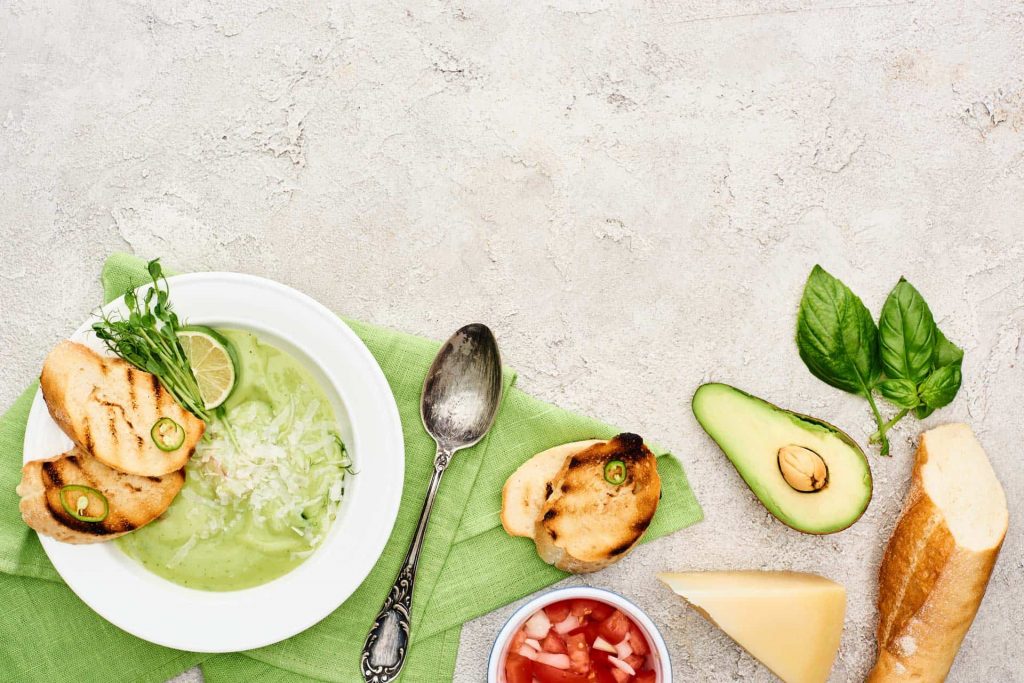 Low impact cooking with avocado, basil, bread, and soup