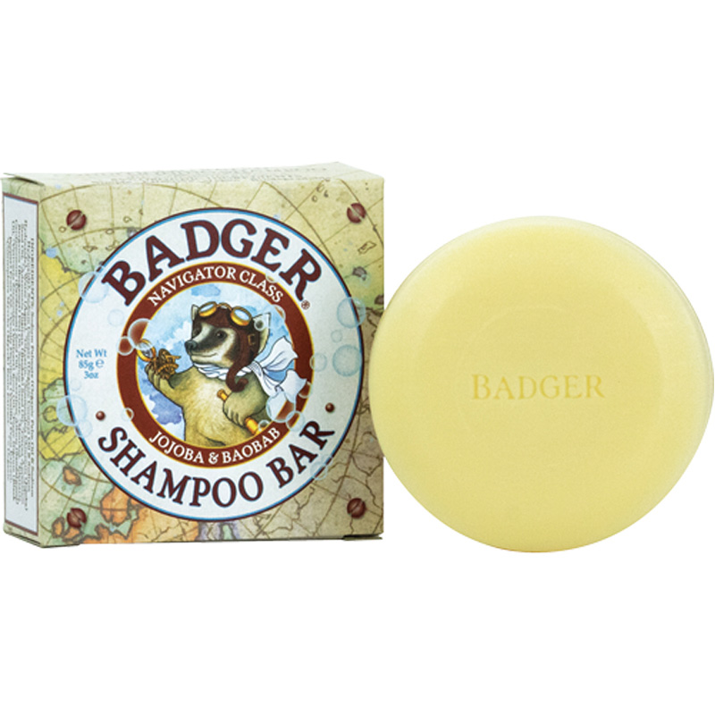 Isolated Badger product box and yellow shampoo bar. 