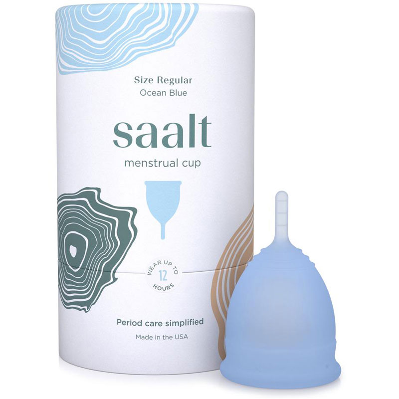 Isolated image of blue Saalt menstrual cup next to cyllinder packaging.
